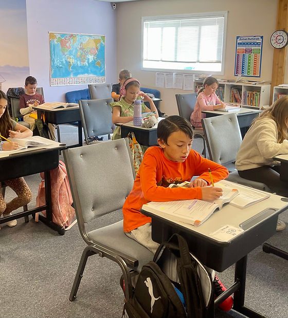 A River Tech classroom with a world map on the wall